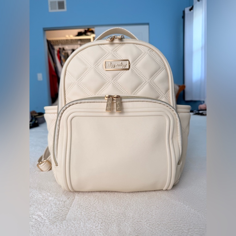 SOLD Itzy Ritzy Mini Plus with Paci Pod